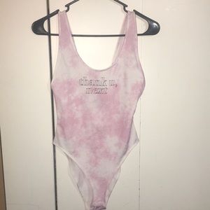 Ariana Grande’s ‘Thank You Next’ Pink Bodysuit
